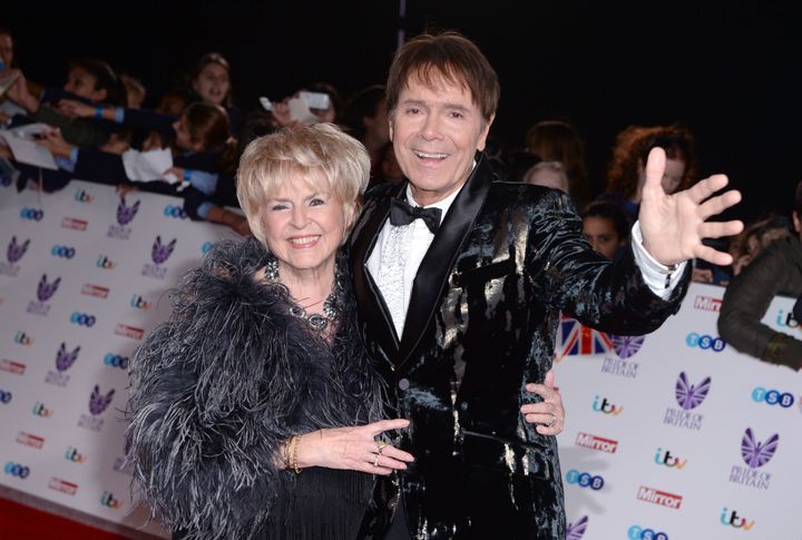 Cliff, here with friend Gloria Hunniford, is pressing on now with his career