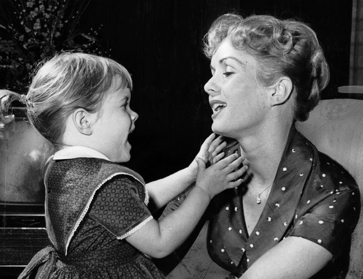 Carrie Fisher, age 3, with her mother Debbie Reynolds in their Los Angeles home on Nov. 16, 1959.