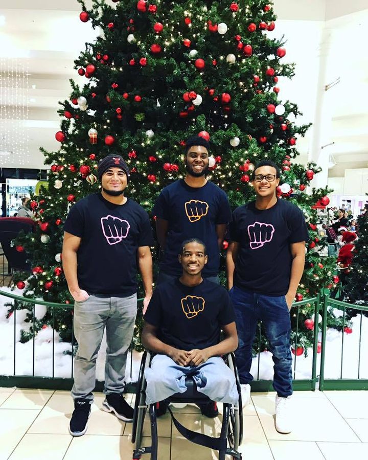 Yaheard, LLC co-founders and executive team (left to right), Joshua Puente, Marcus Spruill, Robert Dates, and DomiNick Downing, pose for a Christmas photo. 