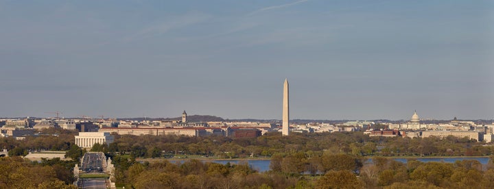 <p>View of the National Mall from across the Potomac River, with the new National Museum of African American History and Culture to the left of the Washington Monument. </p>