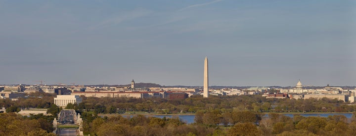 View of the National Mall from across the Potomac River, with the new National Museum of African American History and Culture to the left of the Washington Monument. 