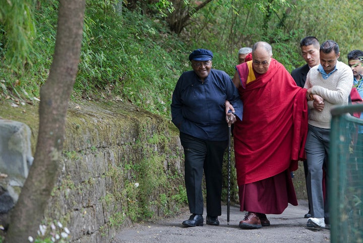 <p>Archbishop Desmond Tutu walks with the Dalai Lama near the Dalai Lama’s home in Dharamsala, India. </p>