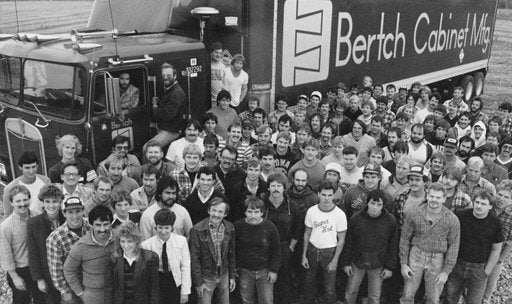 Some of the happy workers of Bertch Cabinets outside the plant in Waterloo, Iowa.