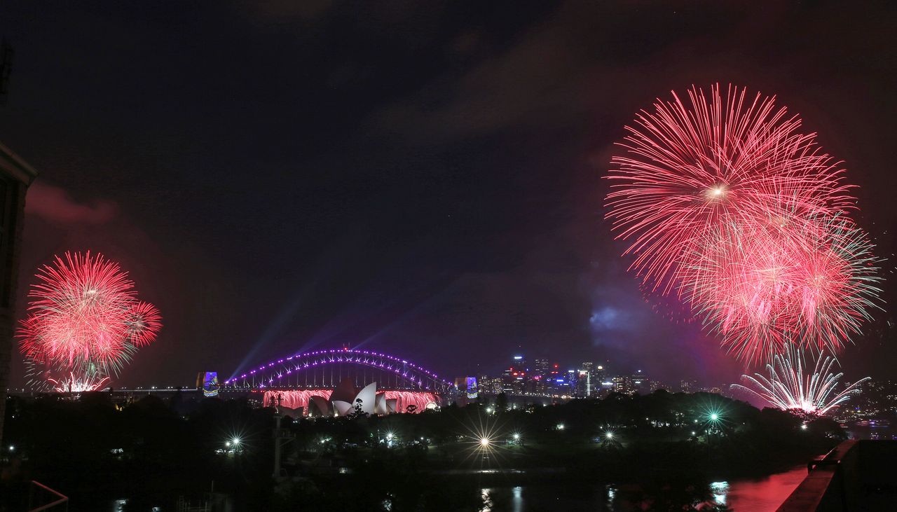 <strong>The glittering display over Sydney’s famed harbour and bridge featured Saturn and star-shaped fireworks</strong>