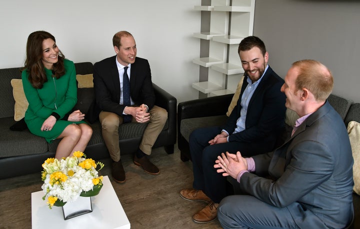 The Duke and Duchess of Cambridge speak with Jonny Benjamin and Neil Laybourn during their visit to St Thomas' Hospital in London, where Jonny was a patient.