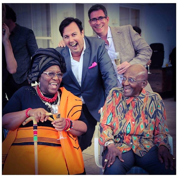 The author shares a laugh with the Archbishop and his wife, and the author’s husband Dr. Perry at the celebration of marriage for Archbishop and Mrs. Tutu’s youngest daughter.