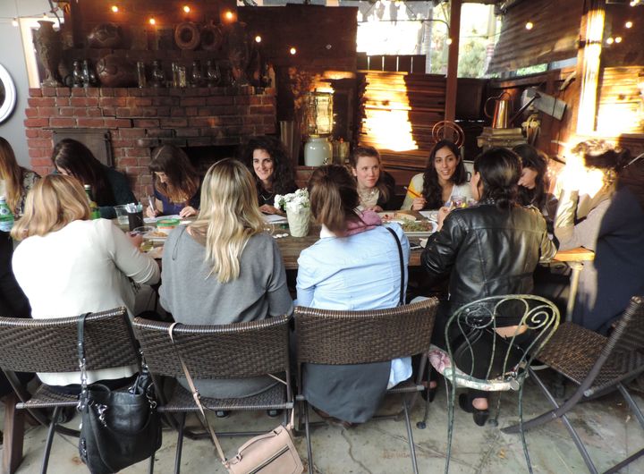 Women at a One Roof coloring book party at their Venice Beach pop-up location in March