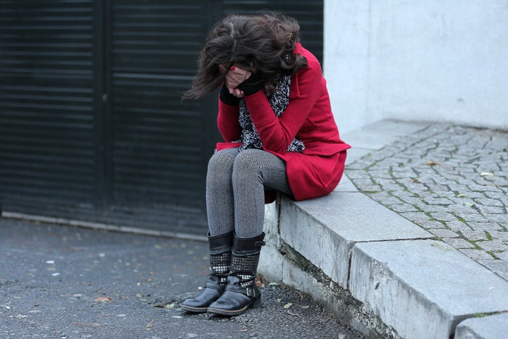 A former employee of the Reina nightclub reacts outside following an attack by a gunman in Istanbul, Turkey, January 1, 2017.