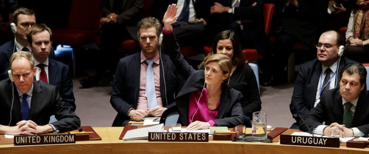 <p>U.S. ambassador to the UN, Samantha Power, raises her hand to abstain from UN Security Council Res. 2334.</p>