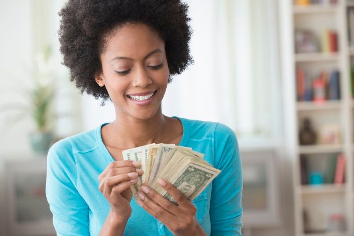 Black Woman With Money In Hand