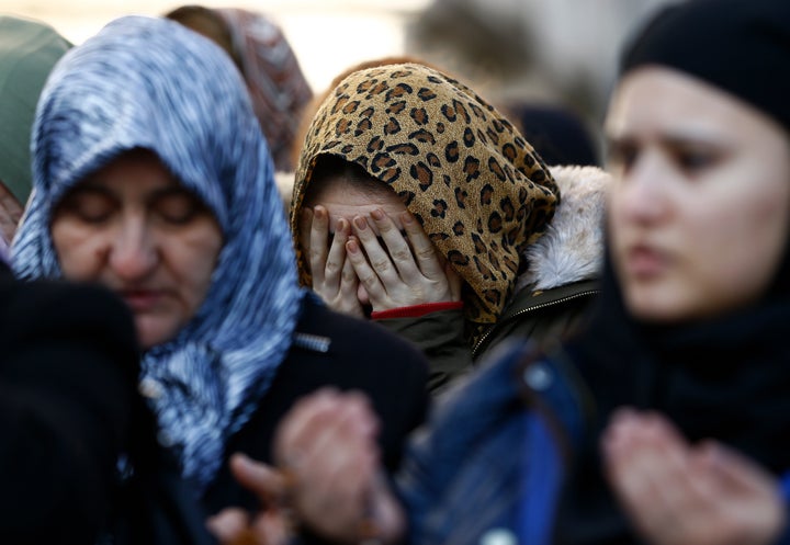 Relatives react at the funeral of Busra Kose, a victim of an attack by a gunman at Reina nightclub, in Istanbul, Turkey, January 2, 2017.