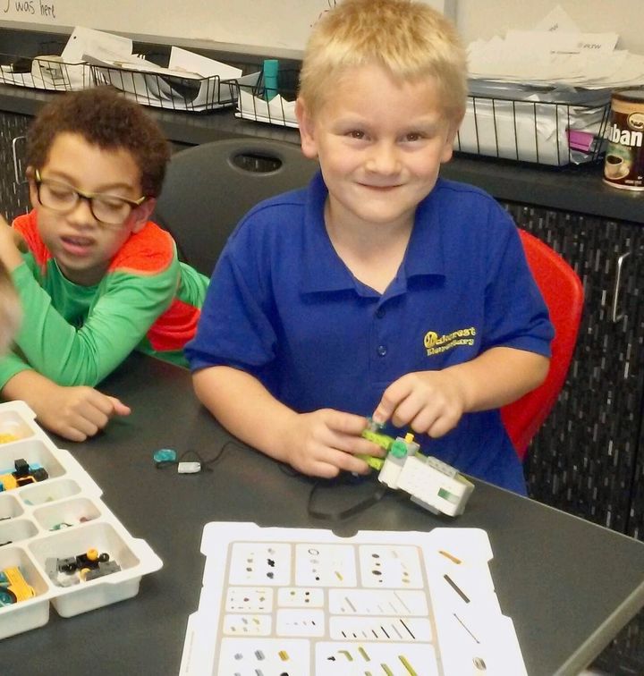 <p><strong>Danny, 7, learns to program a robot using a Lego Wedo Kit at The Cornerstone School in Ocala, FL.</strong> </p>