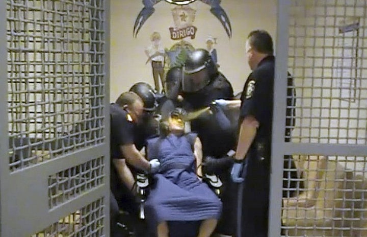 <p>Cell Extraction team in action (2012) detaining inmate Paul Schlosser III at Maine Correctional Center in Windham </p>