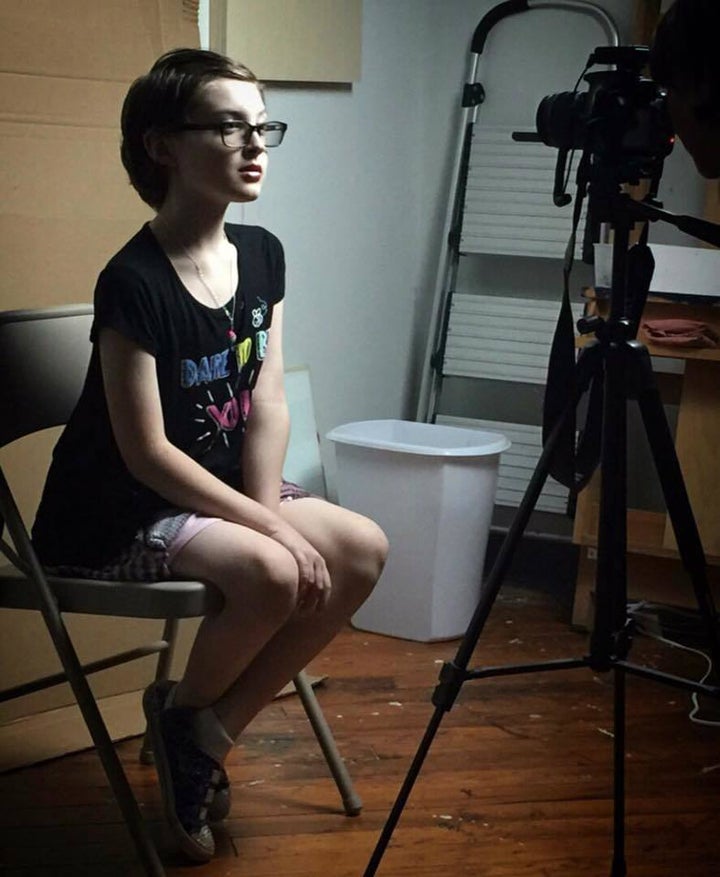 My son, posing for a photo shoot to have his portrait painted by gender-bending N.C. artist Libby O’Daniel 