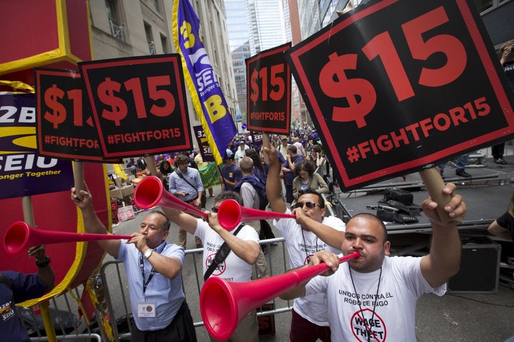 People rally for the $15 minimum wage for fast-food workers in New York.