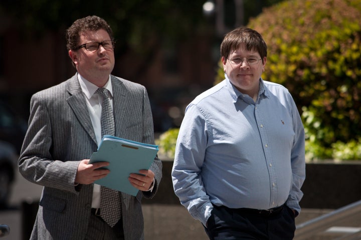 Former Reuters social media editor Matthew Keys (R) arrives at the federal courthouse April 23, 2013 in Sacramento, California.