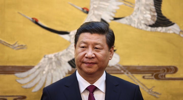 Chinese President Xi Jinping attends a signing ceremony with King Abdullah II bin Al Hussein of Jordan at the Great Hall of People on Sept. 18, 2013.