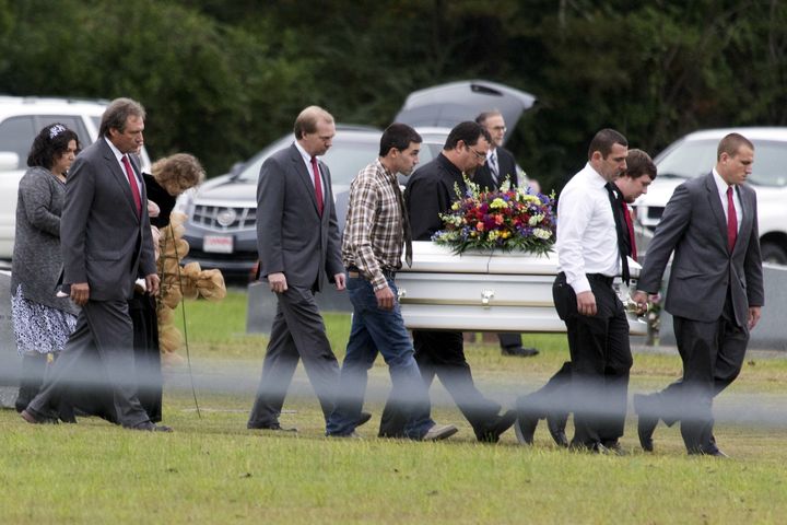 Pallbearers carry the casket of six-year old Jeremy Mardis at a cemetery in Beaumont, Mississippi, November 9, 2015.