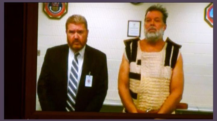 Accused Planned Parenthood gunman Robert Lewis Dear (R) appears in court with public defender Dan King by video link from jail in Colorado Springs, Colorado in this November 30, 2015 still image from pool video.