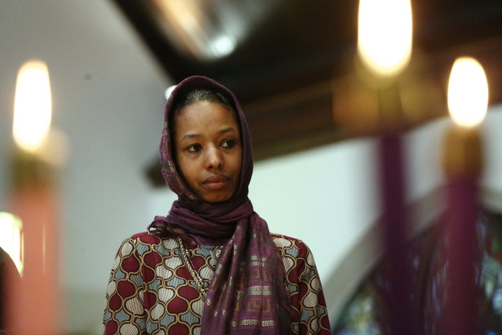 Larycia Hawkins, a Christian who is wearing a hijab over Advent in solidarity with Muslims, attends service at St. Martin Epi