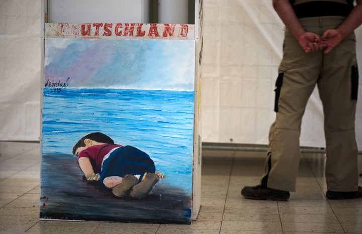 The wall painting made in 2015 by the Syrian refugee, W. Bordany, with the figure of the dead Syrian refugee child Aylan Kurdi is pictured at the empty refugee reception center in Niederau, eastern Germany, on September 22, 2016.