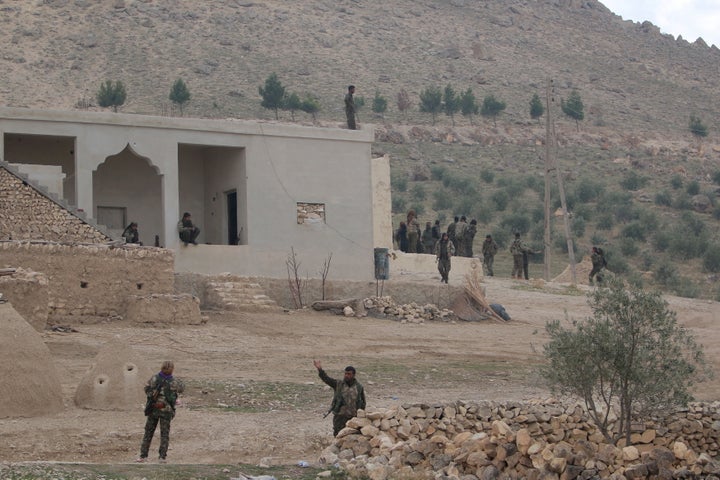 Fighters from the Democratic Forces of Syria gather during what they said was an offensive against Islamic State militants to take control of Tishrin dam