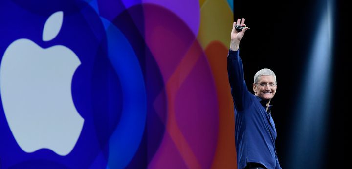 Tim Cook waves before speaking during the Apple World Wide Developers Conference (WWDC) in San Francisco, California, U.S., on Monday, June 8, 2015.