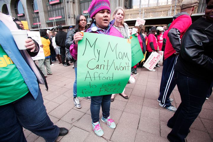 Cheyenne, a student at the Detroit elementary school where her mother is a teacher, participates in a teacher protest, May 3, 2016 in Detroit. Teachers calling in sick closed nearly all of the district's schools after learning they may not get paid because the school system is set to run out of money.