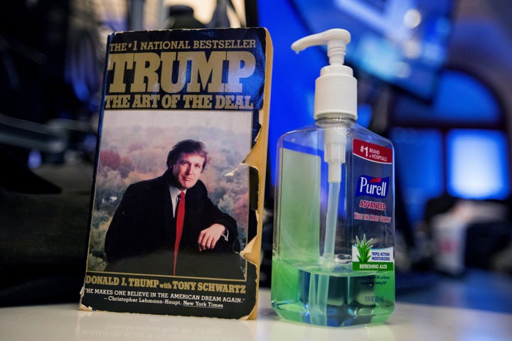 'The Art Of The Deal' by U.S. President-elect Donald Trump is displayed on top of a desk on the floor of the New York Stock E