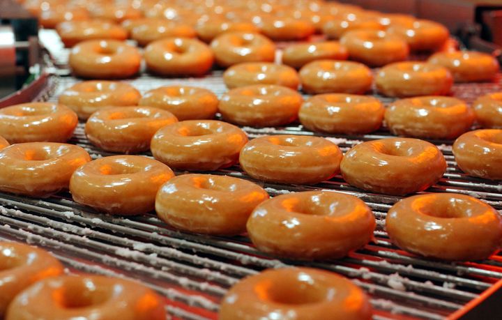Each participant is tasked with downing a dozen Krispy Kreme doughnuts halfway into the race, which are about 2,400 calories, according to the organizers.