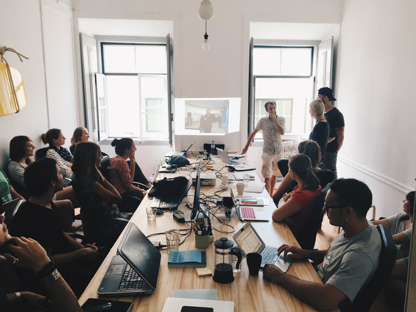 A meeting takes place at Surf Office in Lisbon, Portugal