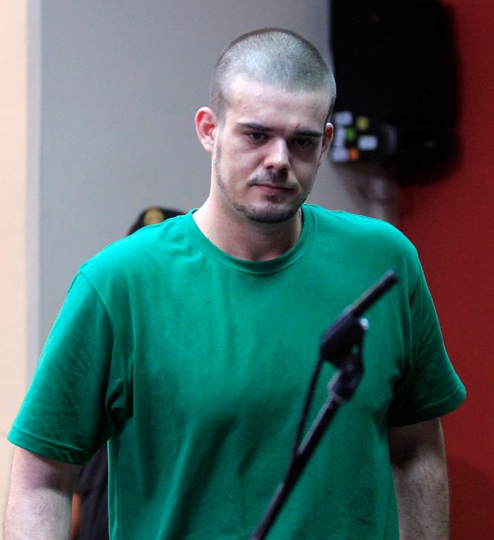 Dutch citizen Joran Van der Sloot walks inside the courtroom during the reading of his verdict, in the Lurigancho prison in Lima January 13, 2012.