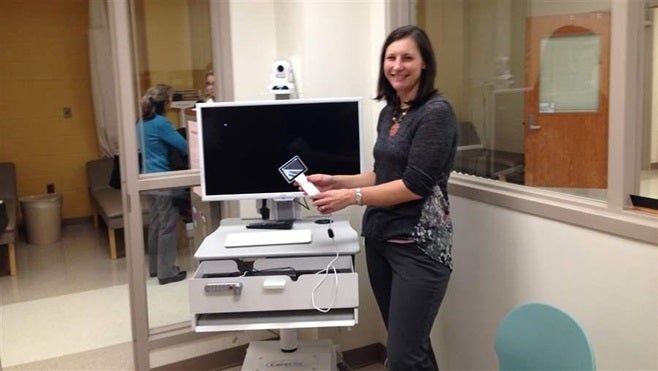 Veronica DeSimone, the school nurse at Ducketts Lane Elementary in Elkridge, Maryland, has conducted nearly 25 telemedicine visits with doctors this school year. Telemedicine is becoming more common in schools across the country.