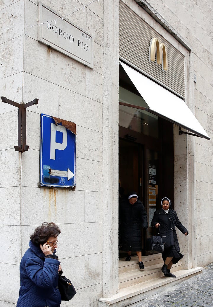 Two nuns leave a McDonald's restaurant at Borgo Pio in Rome, Italy in front of Vatican City's St. Peter's Square January 3, 2