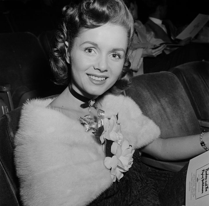 Actress Debbie Reynolds attends a movie premiere in 1952.