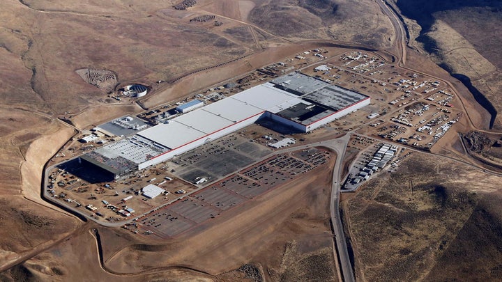 Tesla said its Gigafactory is less than 30 percent complete, but it's already beginning production there.