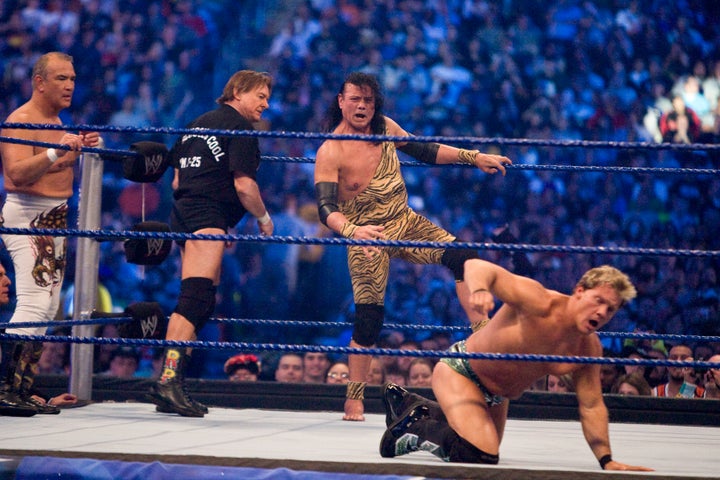 The WWE Hall of Famer is seen entering the ring to fight Chris Jericho during WrestleMania 25 in 2009. Fellow wrestlers Ricky "The Dragon" Steamboat and "Rowdy" Roddy Piper look on.