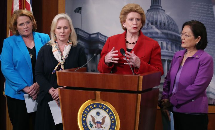 Sens. Heidi Heitkamp (far left) and Debbie Stabenow (second from right) could face tough re-election races in 2018.