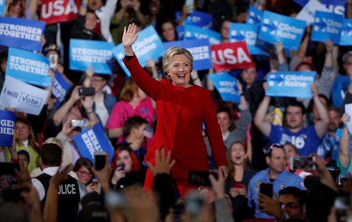 Hillary Clinton gave a stump speech Tuesday night, but cable TV was tied up covering Donald Trump hawking his line of steaks. 