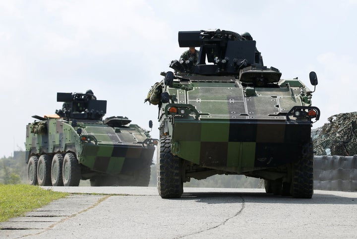 Soldiers drive CM33 "Clouded Leopard" infantry fighting vehicle during annual Han Kuang military drill simulating the China's