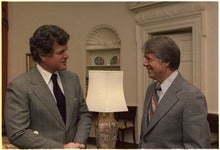 President Jimmy Carter (right) with Senator Ted Kennedy in the Oval Office of the White House, December 1977.