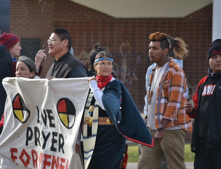 A march by water protectors in Mandan, North Dakota, to offer forgiveness to law enforcement, and prayers for their well being.