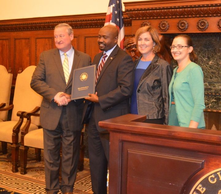 Herman receives a citation from Philadelphia mayor Jim Kenney for his contributions to immigrant entrepreneurship in the city.