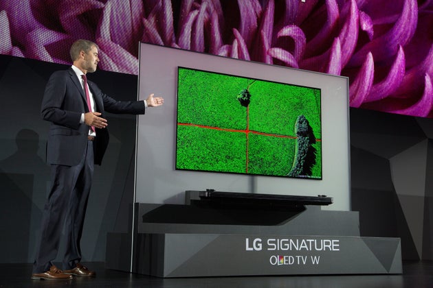 LG's 4K OLED TV Is So Paper Thin It Is Making Our Brain