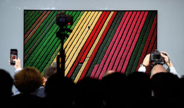 LG's 4K OLED TV Is So Paper Thin It Is Making Our Brain
