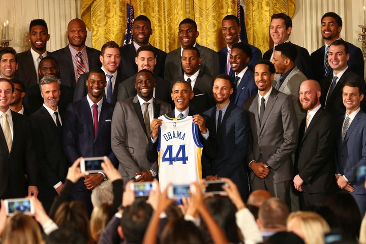 President Barack Obama poses with the Golden State Warriors in the East Room of the White House on Feb. 4, 2016.