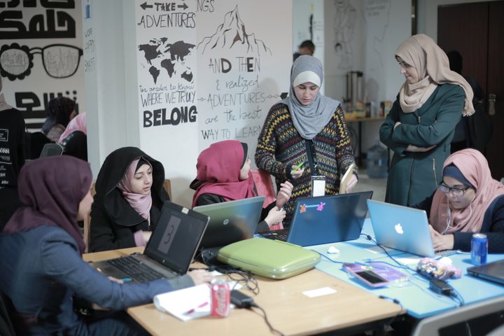 Ghadeer and other entrepreneurs at work at the Gaza Sky Geeks coworking space
