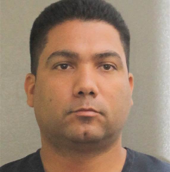 Broward County Sheriff's Deputy Peter Peraza was responding to 911 calls about a man carrying a weapon when he fatally shot t