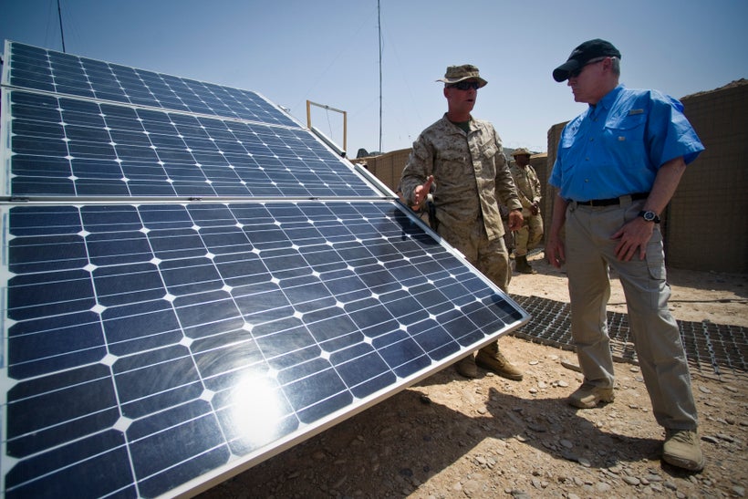 HELMAND PROVINCE, Afghanistan (June 25, 2011) Secretary of the Navy (SECNAV) the Honorable Ray Mabus observes an array of so