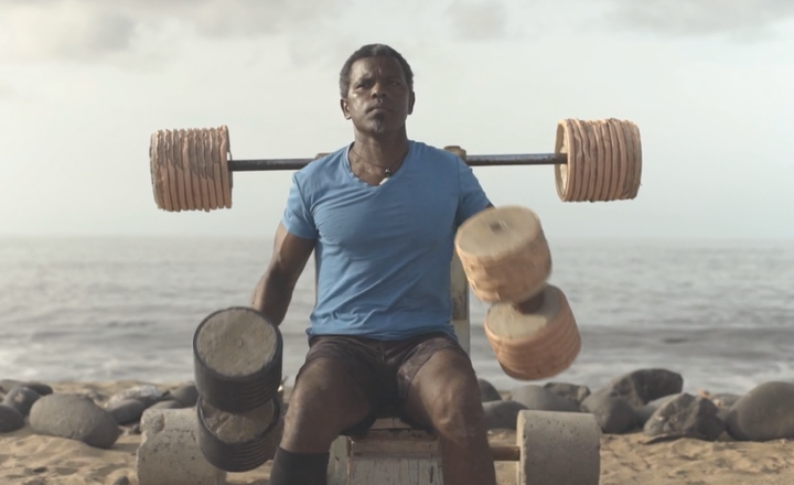 Alcindo Almedia Soares works out in the gym he built by hand. 